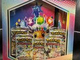 a box of pokemon trading cards on display in a store