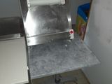 a machine that is sitting on a table in a kitchen