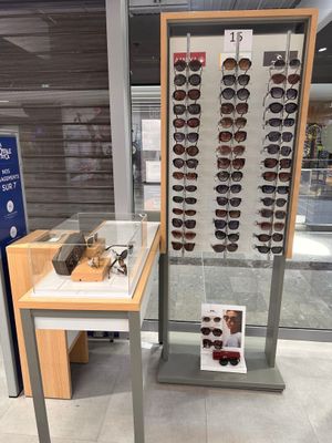 a lot of glasses on display in a store