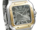 a close up of a wrist watch with roman numerals on it