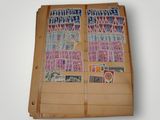 a book with stamps on it sitting on a table
