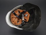 a close up of a helmet on a black background