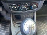 a close up of a car ' s gear lever and dashboard
