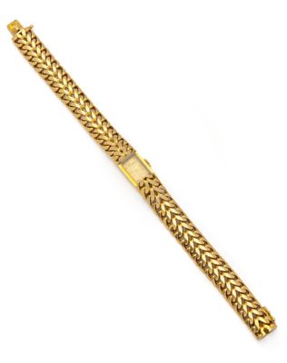 un bracelet en or 18 carats à maillons de type « curb »