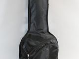 an image of a guitar case sitting on top of a white surface