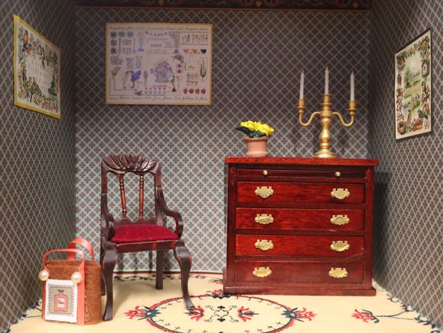 Diorama. Composition miniature, dans une vitrine en bois, vitre e...