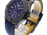 the watch has a blue dial and a yellow strap