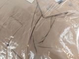 a large box wrapped in plastic sitting on a table