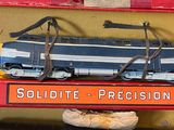 a toy train that is sitting on top of a shelf