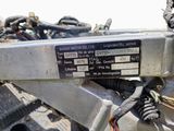 a close up of a motorcycle with a number plate on it