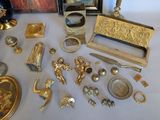 a lot of antique items that are on the table