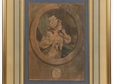a framed picture of a woman holding a coin in her hand