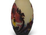 a vase with a floral design on it on a white background