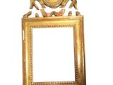 a picture of a gold frame with a picture on it