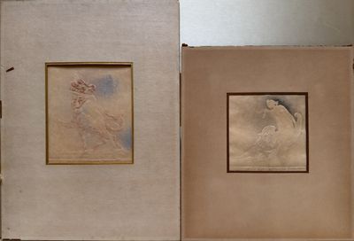 two framed pictures of a woman in a dress on a table
