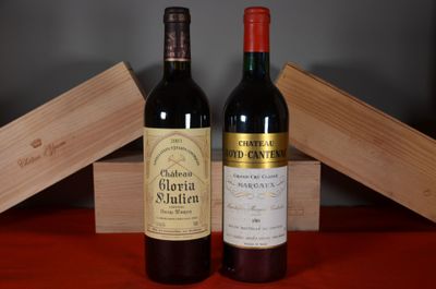 two bottles of wine sitting next to each other on a table