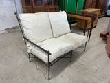 a white couch that is sitting in a room