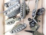 a box full of toy military vehicles in it