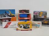 many different types of construction toys in boxes