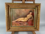an oil painting of a nude woman sitting on a red chair