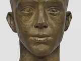 an image of a bronze head of a boy on a marble base