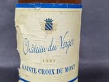 a bottle of wine that is sitting on a table