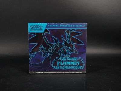 un gros plan sur une boîte de cartes à collectionner Pokémon posée sur une table