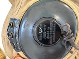 a close up of a backpack with a metal object in it