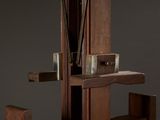 an image of a wooden chair with a door open