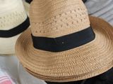 three hats that are sitting on a table