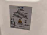 a close up of a toilet with a sign on it