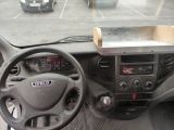 a box in the driver ' s seat of a vehicle