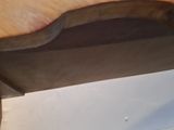 a piece of wood that is sitting on top of a table