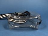 a clear bag with a black and white stripe on it