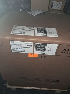 a cardboard box that has some stickers on it