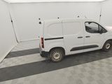 a white van that is parked in a garage