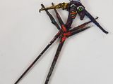 a picture of a stick sculpture of a person on skis