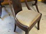 two chairs and a table in a room