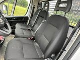 a black seat in the back of a white van