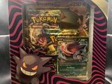 a box of pokemon cards in a display case