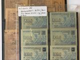 beaucoup de vieux billets de banque posés sur une table