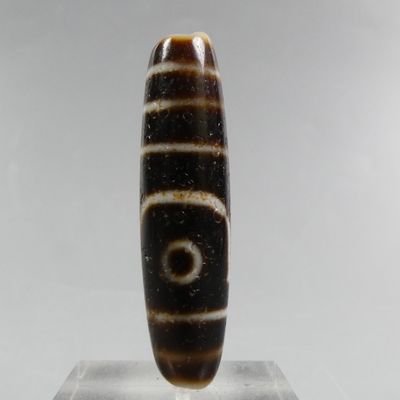 a close up of a glass object on a clear surface