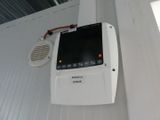 an image of a home security device mounted on a wall