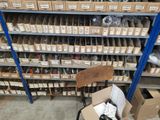 a pile of boxes and boxes on a carton in a warehouse