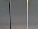two lamps that are sitting next to each other on a table