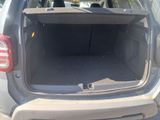the back of a car with its trunk open and the trunk of the car in the back