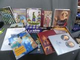 a lot of books on a table that are sitting on a table