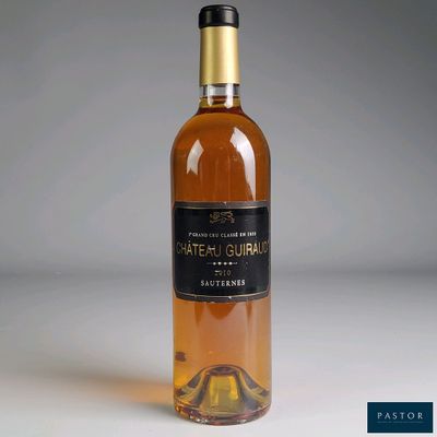 a bottle of wine that is sitting on a table