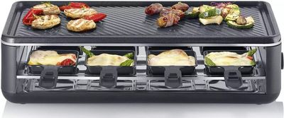 une photo d'un barbecue sur lequel sont disposés plusieurs types d'aliments différents