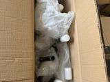 a cardboard box with a bunch of items inside of it